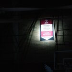 Unified Champion School banner under a spotlight